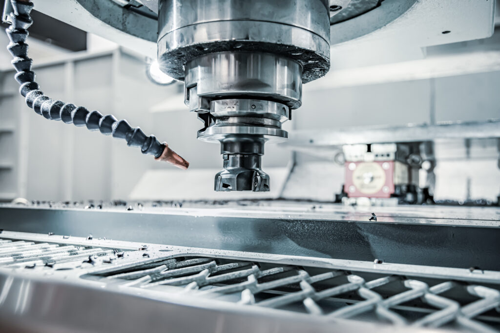 Metalworking CNC lathe milling machine. Cutting metal modern processing technology. Milling is the process of machining using rotary cutters to remove material by advancing a cutter into a workpiece.